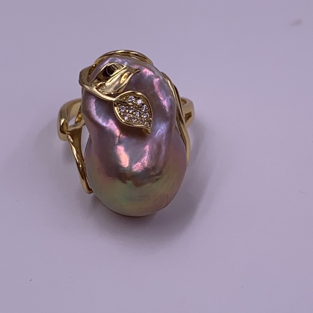 Large freshwater pearl with CZ on Sterling Ring